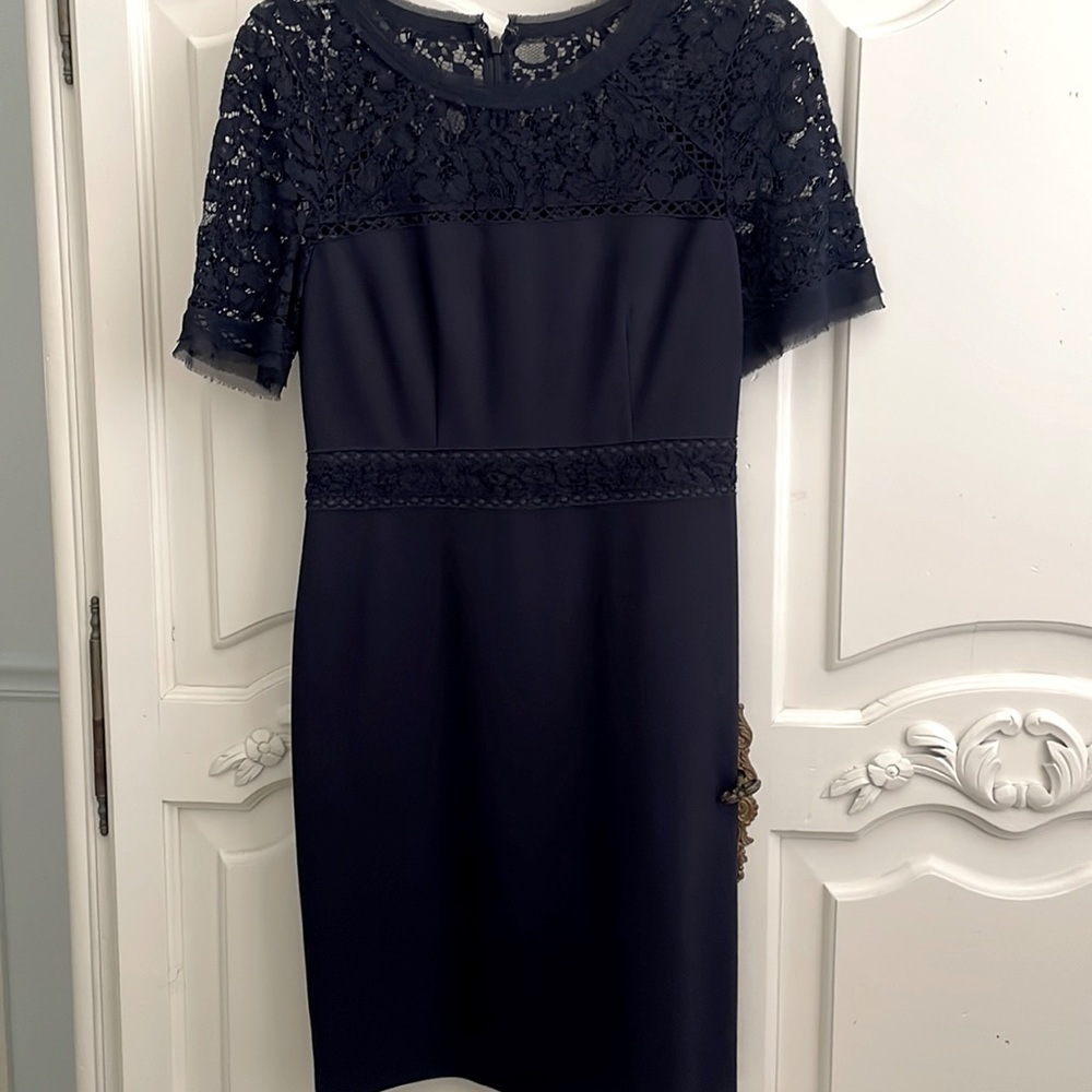 Dark Blue dress with lace top and waist band. Above the knee length. Like new!